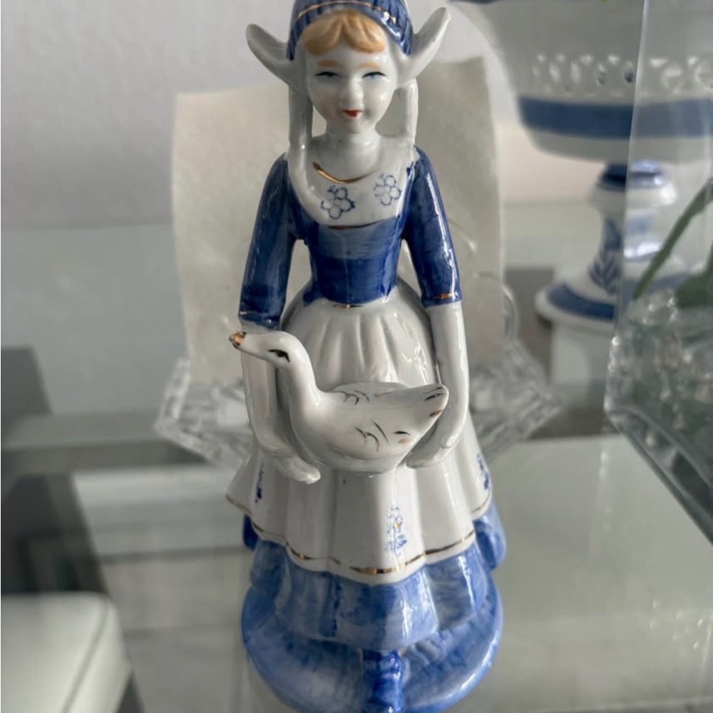 A Vintage Delft Blue and White Porcelain Figurine.